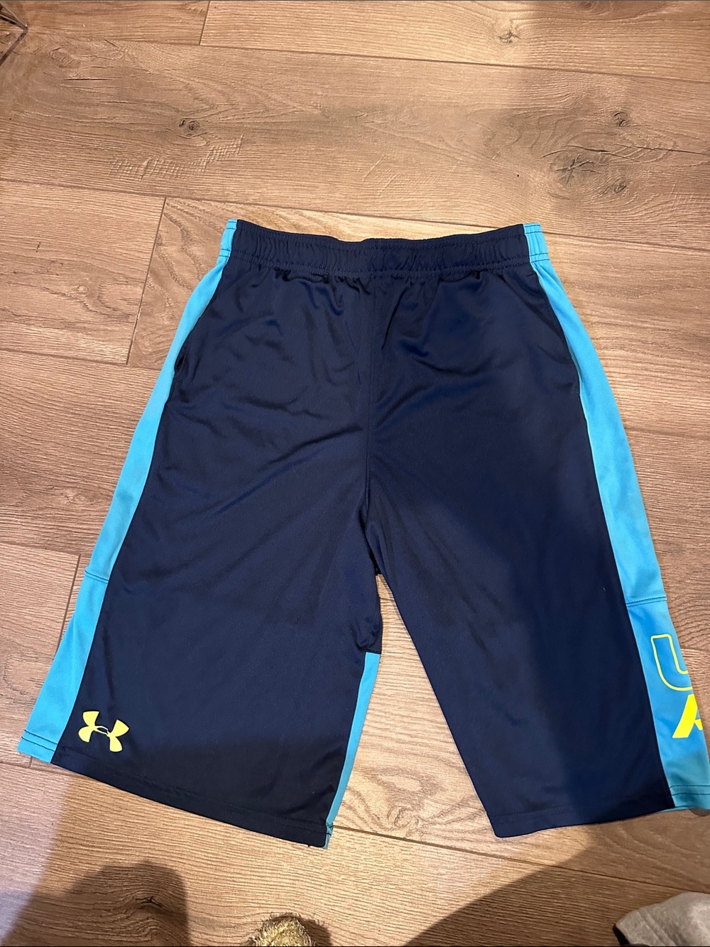 Under Armour Navy Shorts with Light Blue Side Panels and Yellow Logo